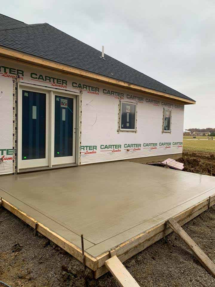 concrete slab addition at the back of a house