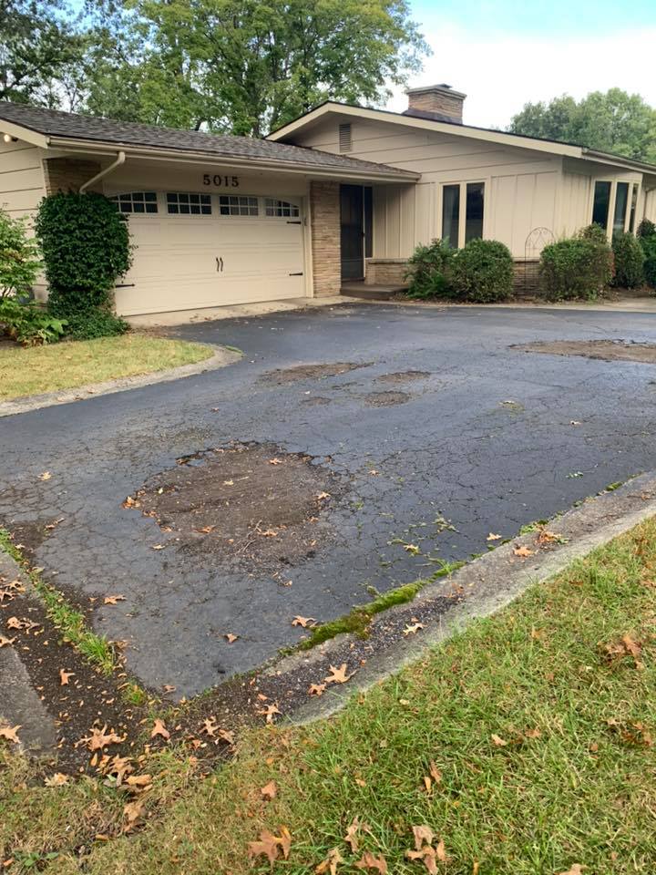 cracked and damaged driveway