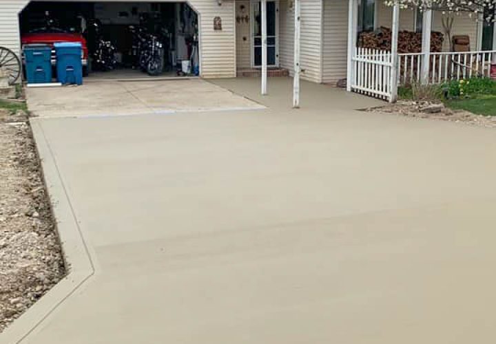 newly constructed concrete driveway and sidewalk